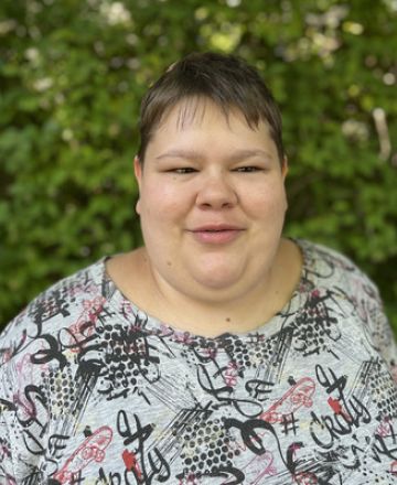 Bild von Melanie, die lächelt