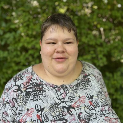 Bild von Melanie, die lächelt
