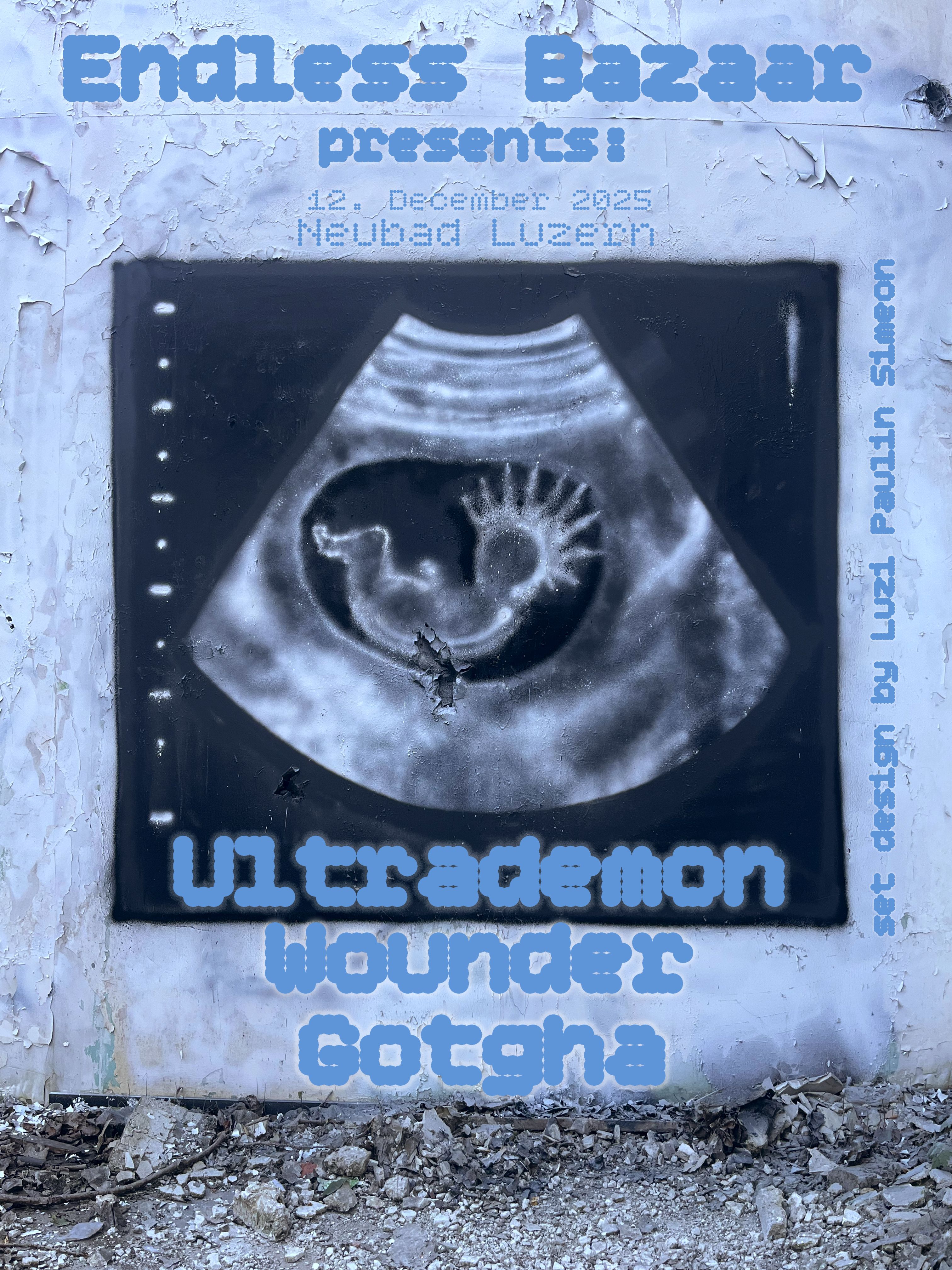 Eine Wand mit einem Embryo Graffiti und hellblauer Schrift